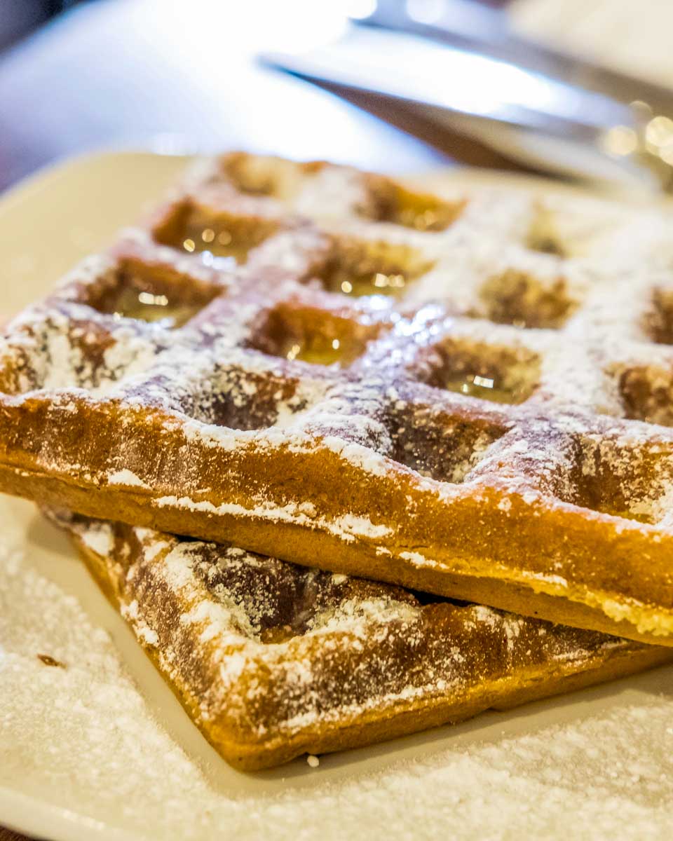 Belgian waffles eaten on a food and drink tour in Bruges Belgium