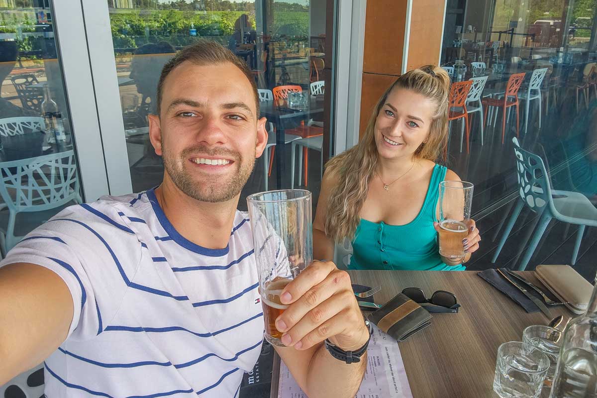 Daniel-and-Bailey-take-a-selfie-drinking-a-beer-in-Liverpool-UK