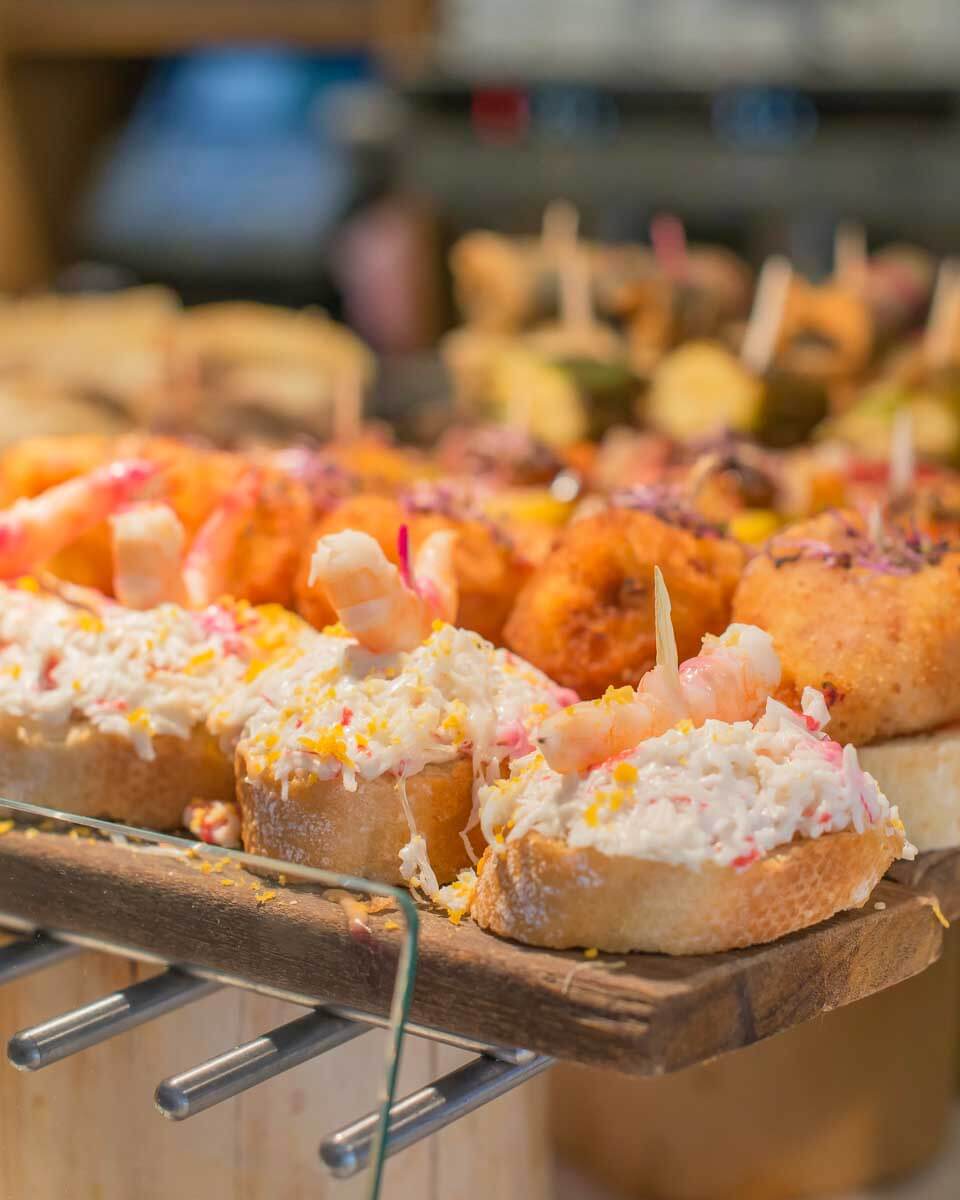 Tapas pintxos eaten on a food tour in San Sebastian Spain