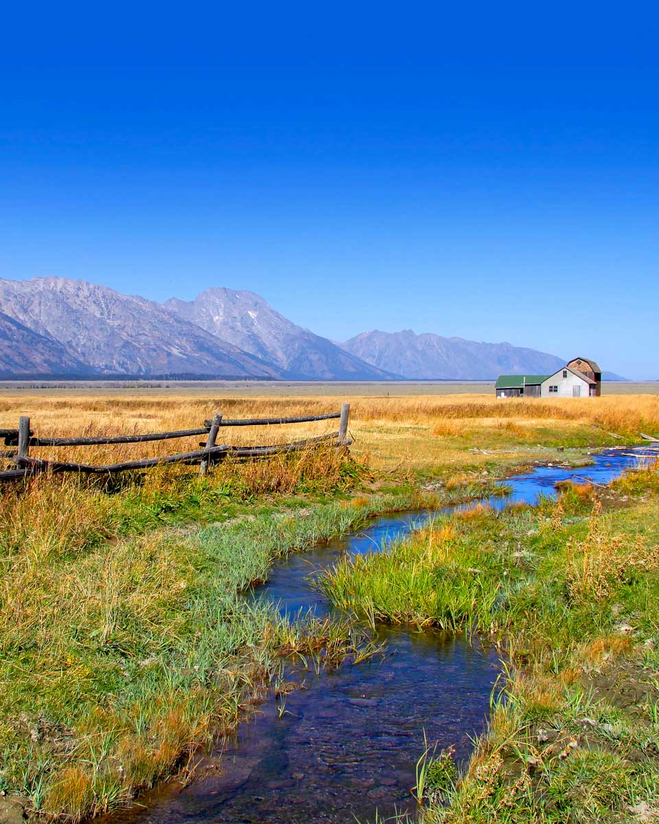 An old barn seen in the Grand Tetons from Jackson Hole Wyoming