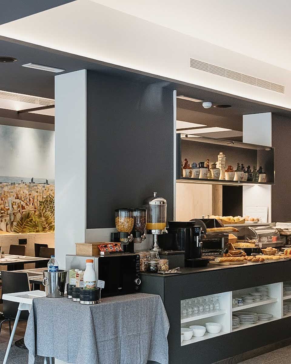 Continental breakfast area at the Hotel Travessera in Barcelona