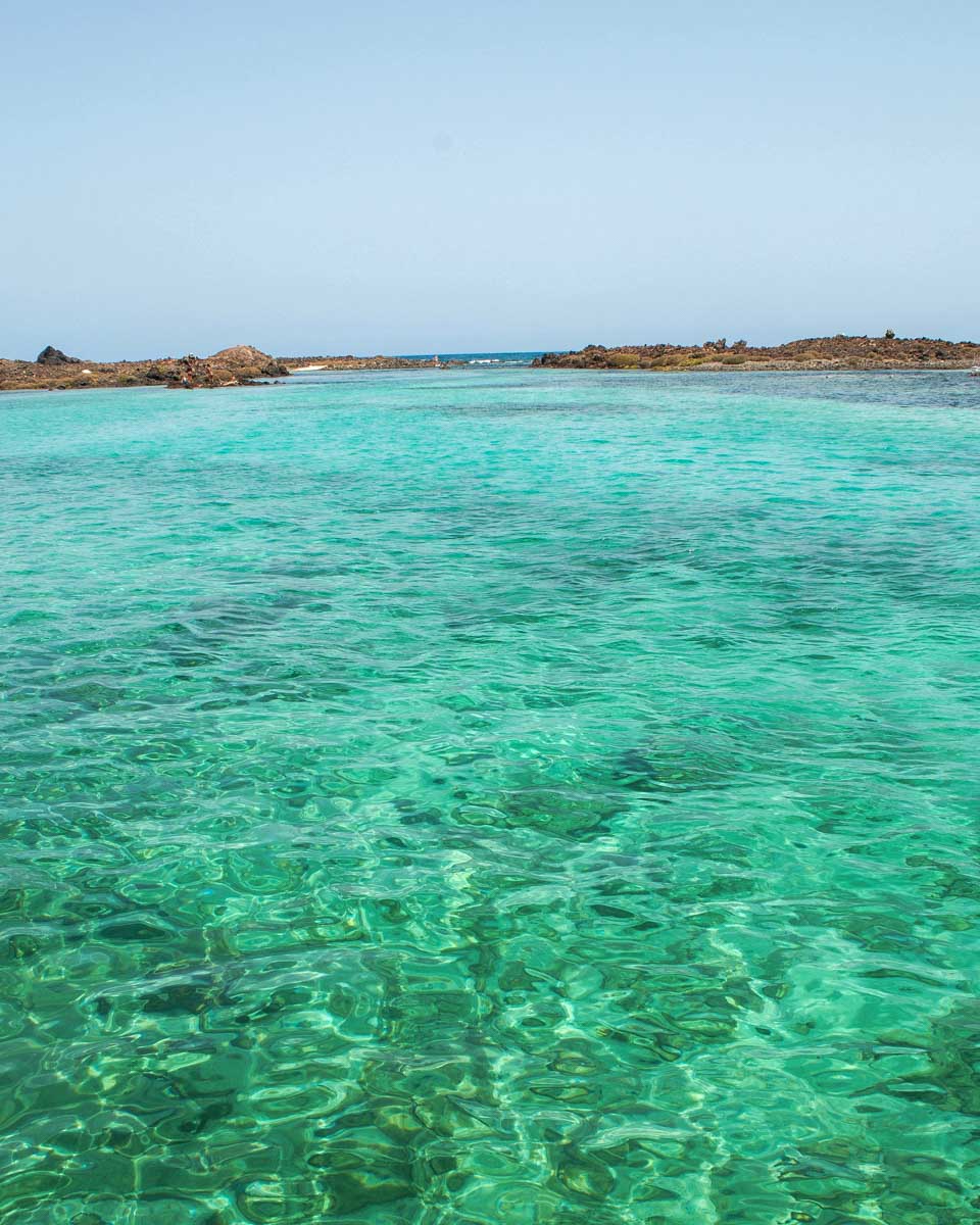 Crystal clear waters on Lobos Island seen on a tour from Fuerteventura Canary Islands