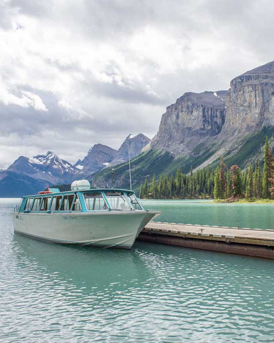 A-boat-sitting-at-the-dock-of-spirit-island-on-maligne-lake Jasper