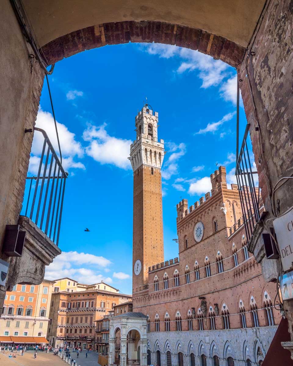 Campo Square with Mangia Tower Siena Italy on a tour from Florence