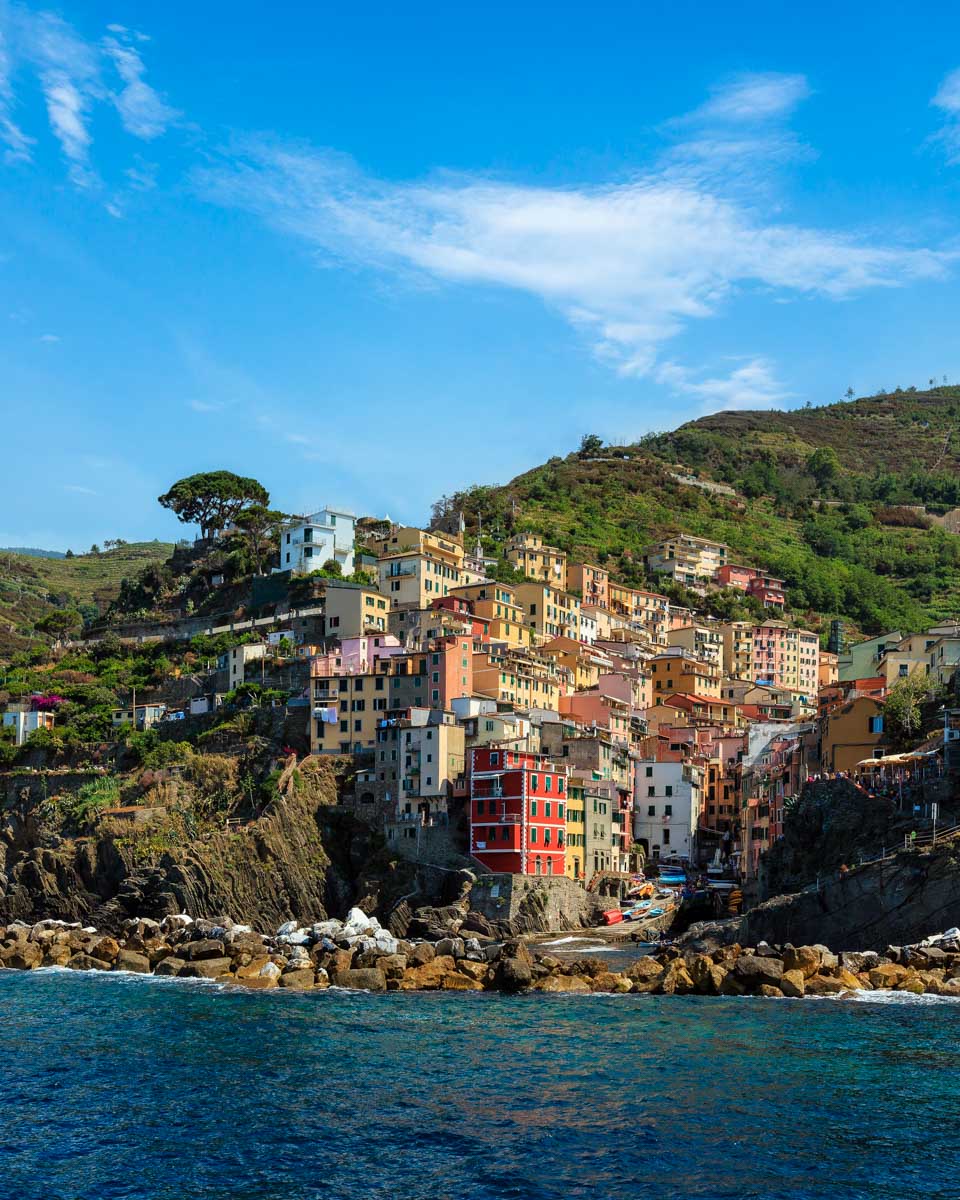 Manarola Village in Cinque Terre seen from the water on a boat tour from Monterosso Italy