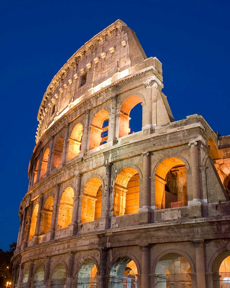 The Colosseum seen at night on an evening Vespa Tour in Rome Itay