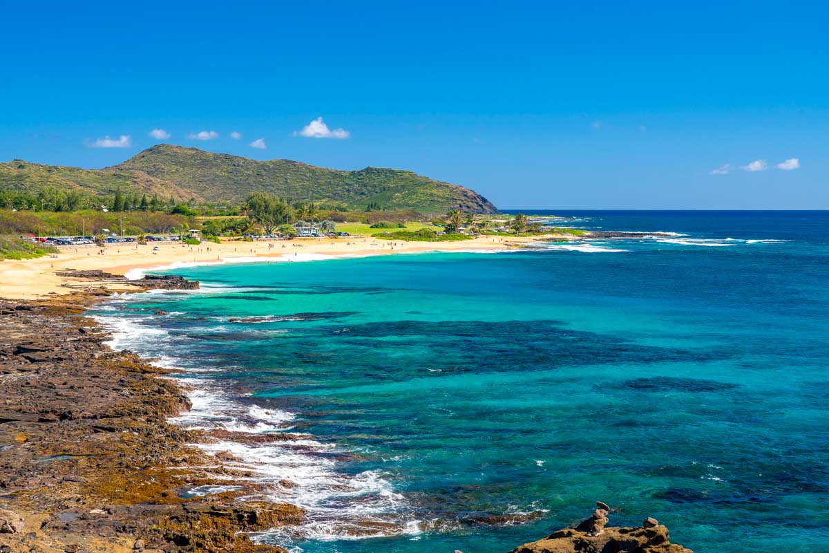 View down the Sandy Beach Park coastline near Waikiki on Oahu Hawaii