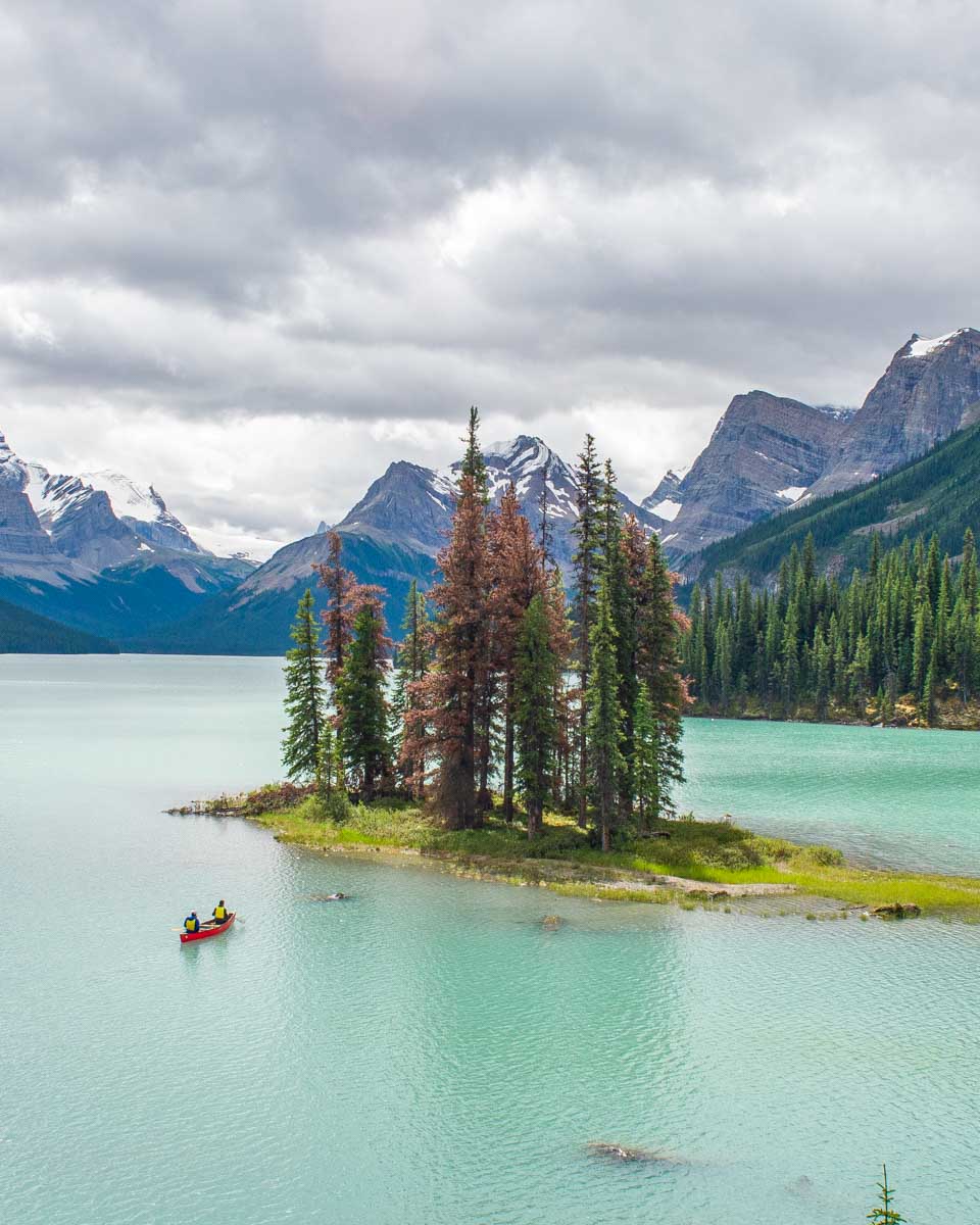A-person-canoes-around-Spirit-Island-on-Maligne-Lake-Canada from Jasper Alberta