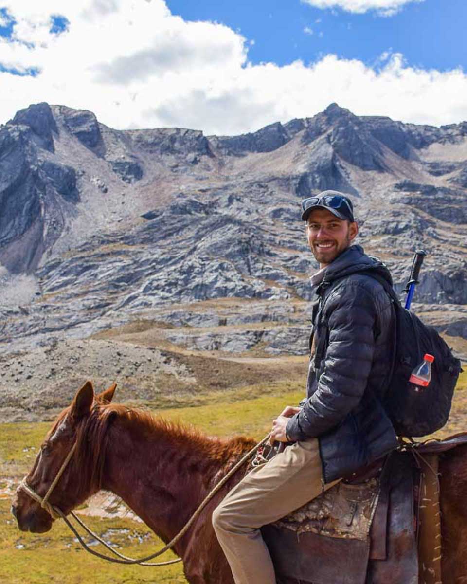 Daniel-Horseback-riding-in-the-mountains-near-Cusco-on-a-tour Peru