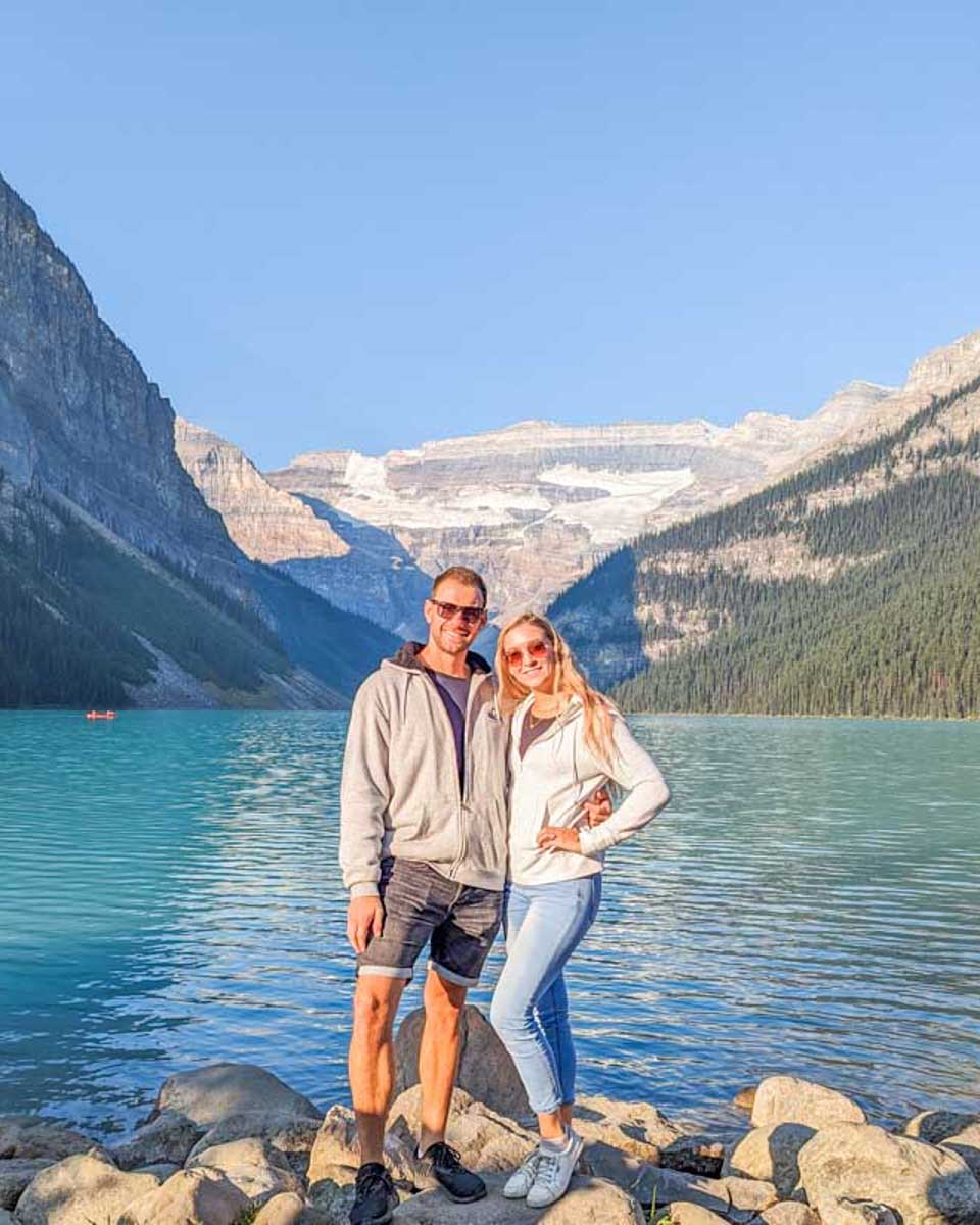 Daniel-and-Bailey-pose-for-a-photo-at-Lake-Louise on a tour from Calgary Alberta