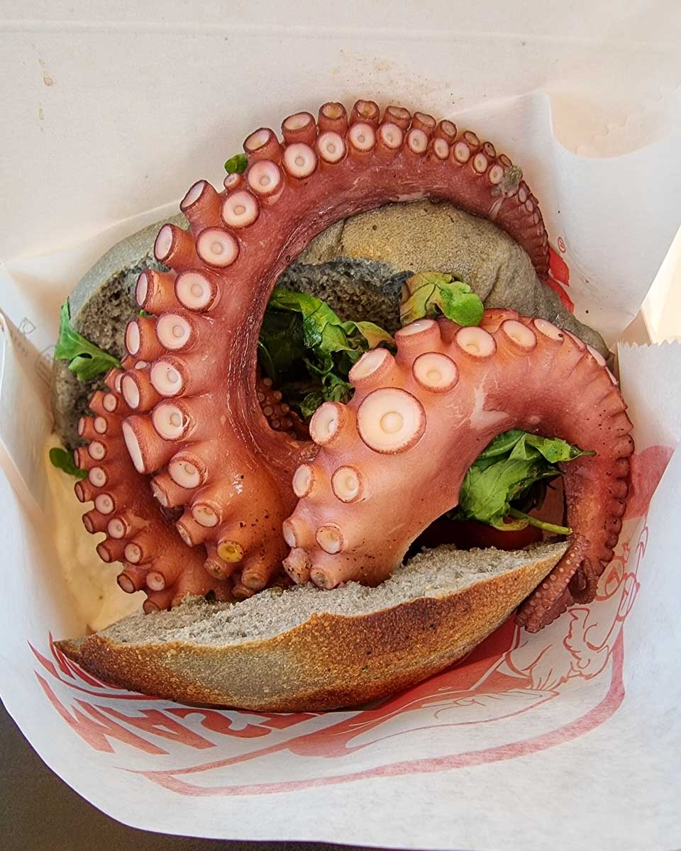 Food eaten on a food tour in Bari Italy octopus sandwich