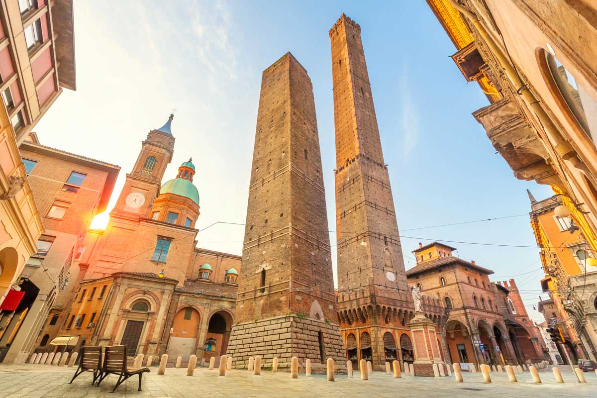 Looking up at the two famous falling towers of Bologna