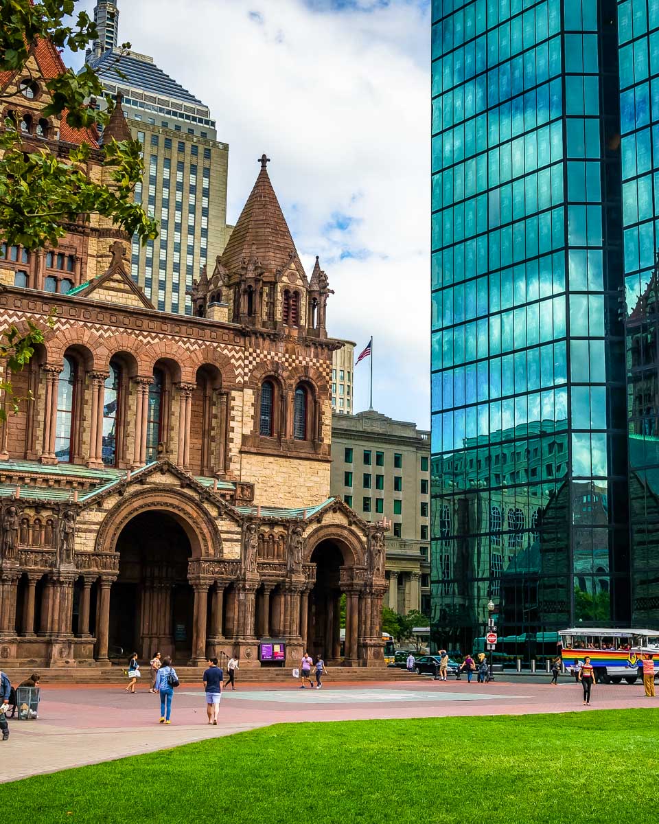 The John Hancock Building and Trinity Church at Copley Square in Boston Massachusetts