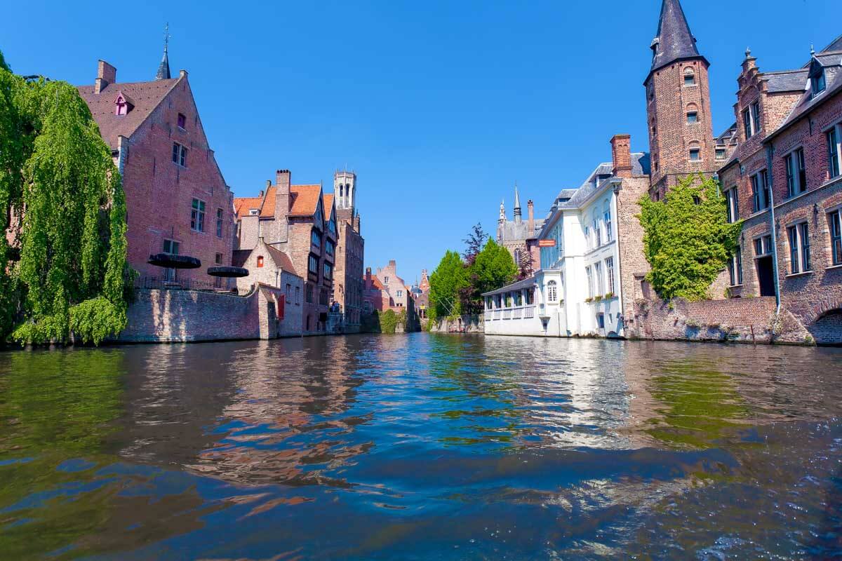The canal seen from a boat on a tour of Bruges Belgium