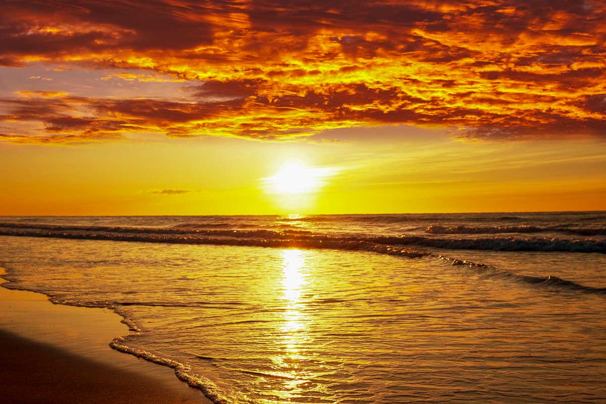 The sunset at Sunset Beach Park in Oahu Hawaii