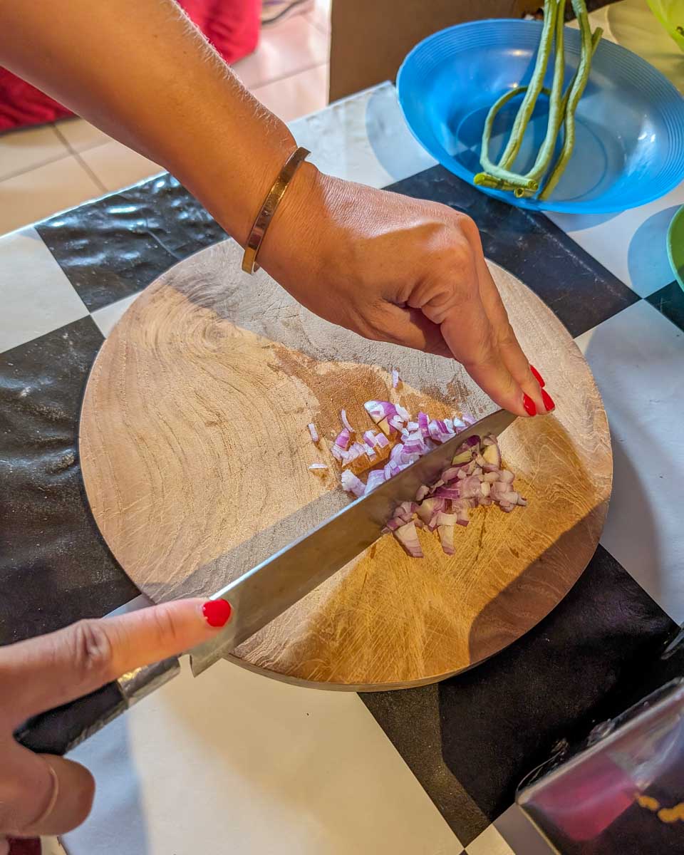 Bailey-chops-vegetables-during-a-cooking-class-in-Oaxaca Mexico