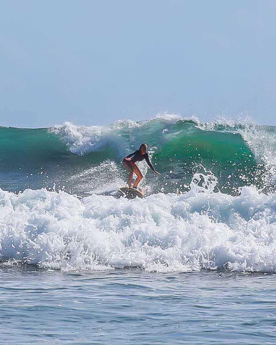 Bailey-surfing-at Zurriola Beach in San Sebastian Spain