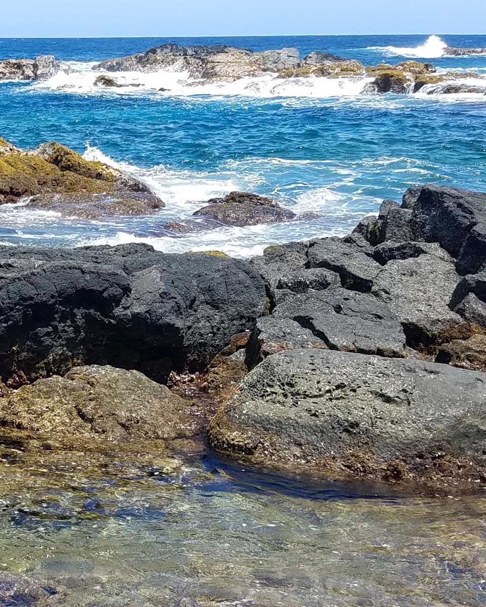 Black Lava Rock on the Beach at Richardson Ocean Park, Hilo