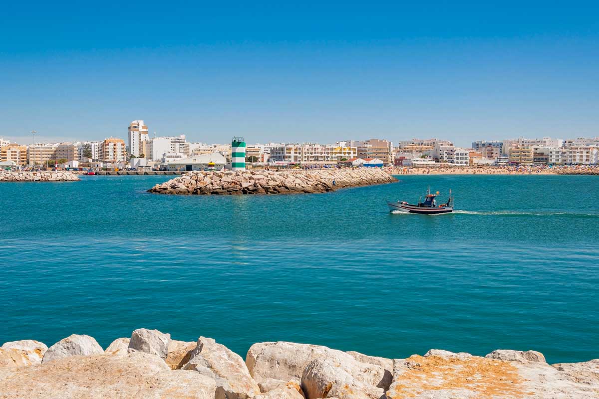 Fishboat enters the port of VIlamoura in Albufeira Portugal