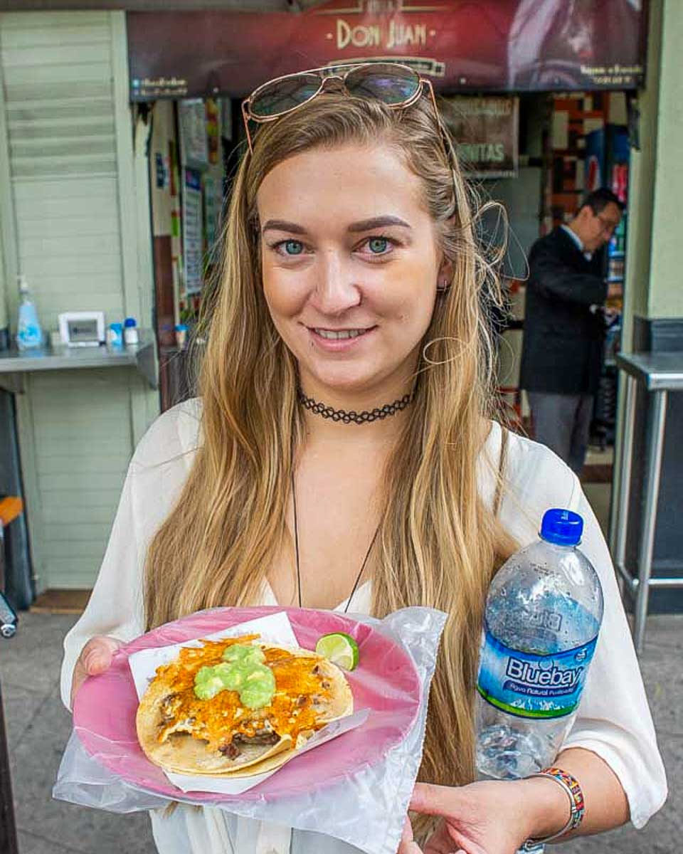 Bailey-with-a-shrimp-taco-in-Puerto Vallarta-Mexico