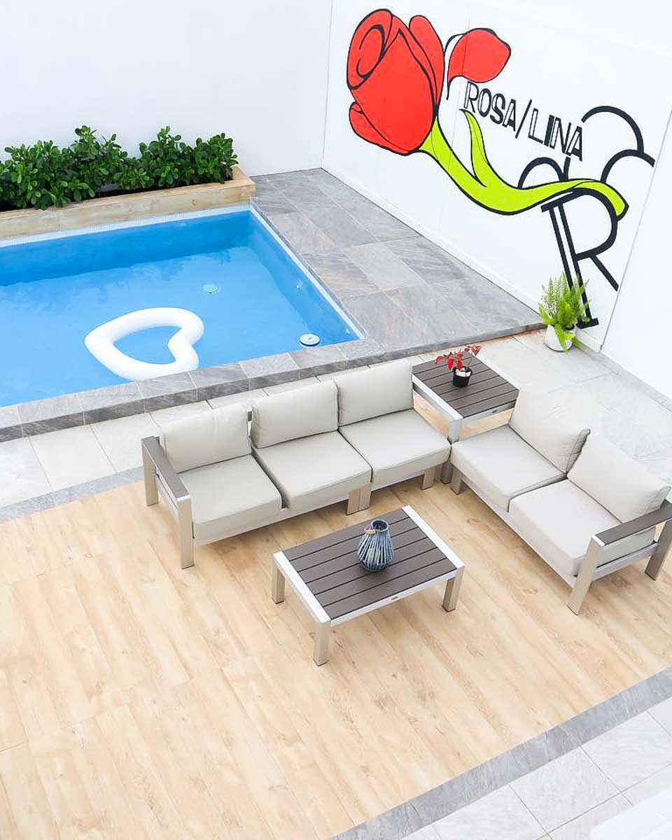 Outdoor pool area at Rosa Lina Ocean Park in San Juan