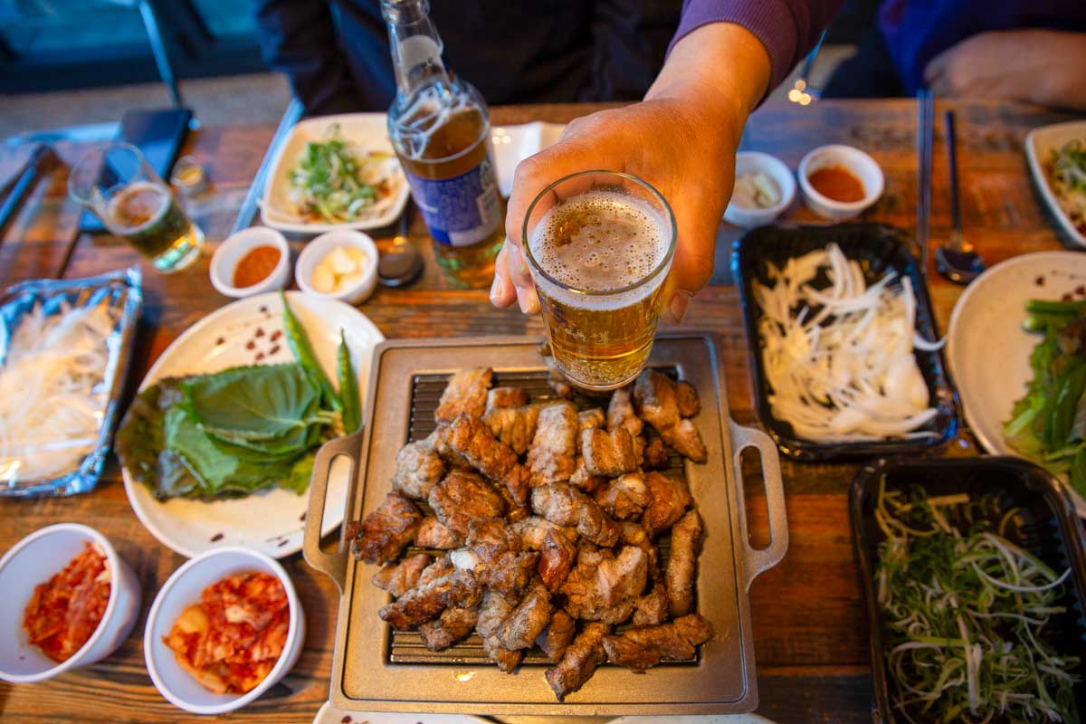 People-eat-Korean-barbeque-in-Jeju-South-Korea