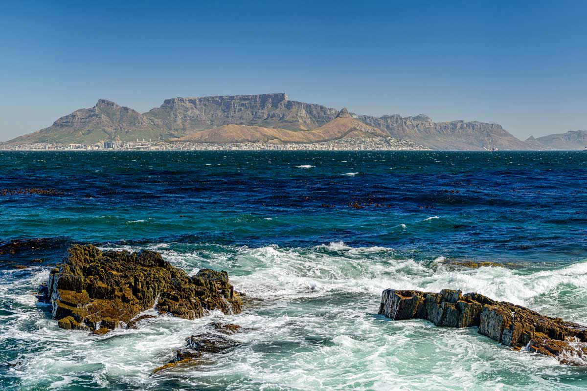 Table mountain in Cape Town from a distance Robben Island seen on a tour from Cape Town South Africa