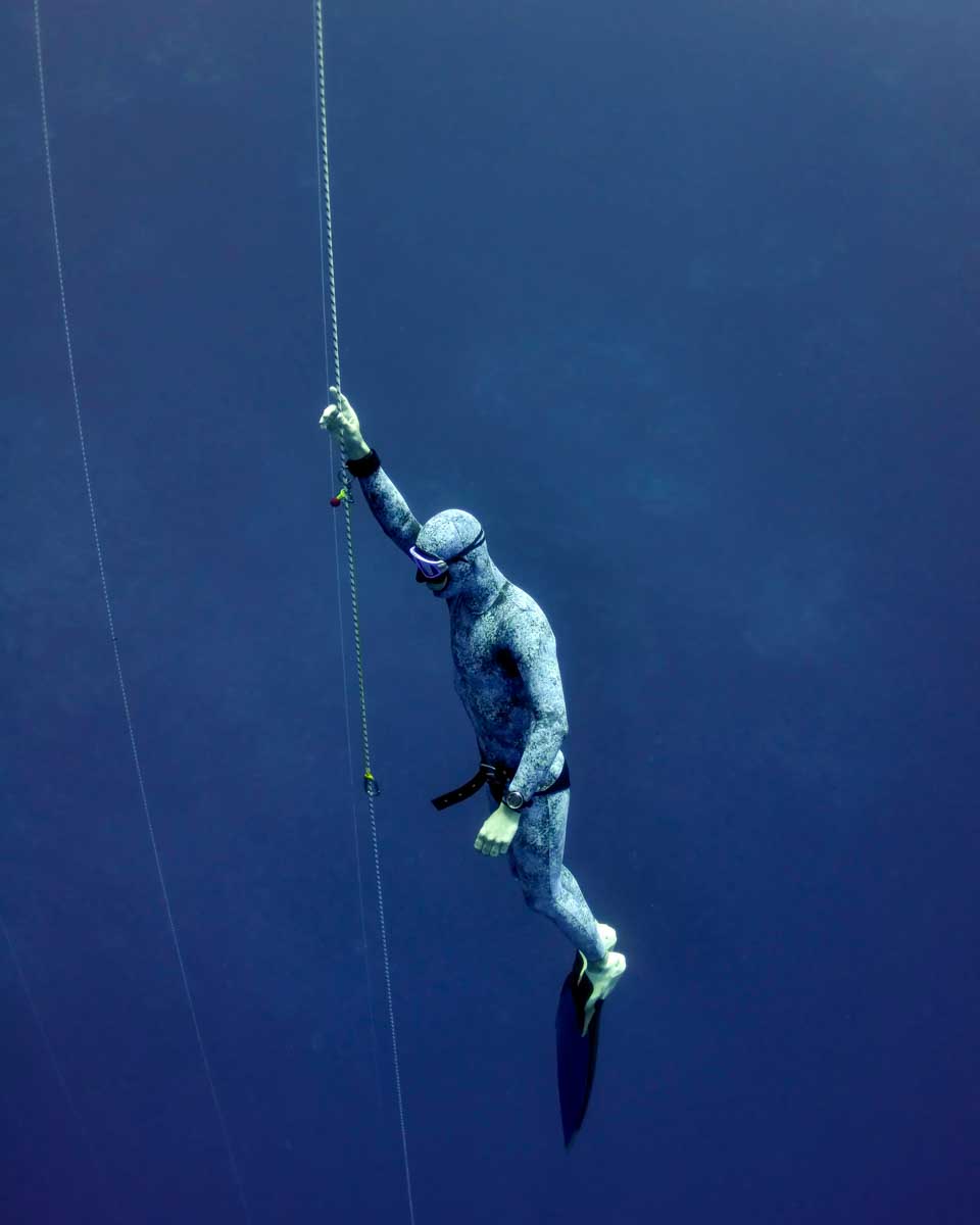 A man freedives in Bohol Philippines