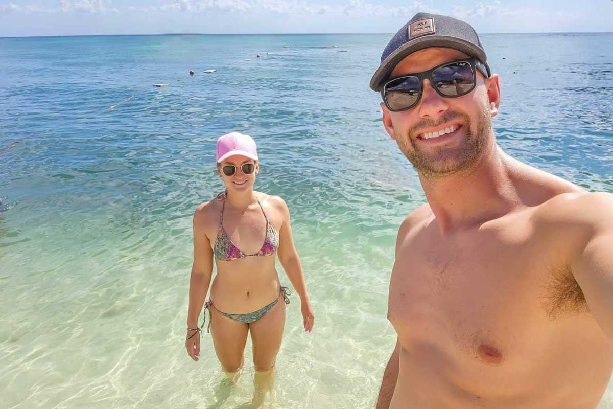 Daniel-and-Bailey-take-a-selfie-on-the-beach-in-El Nido Philippines