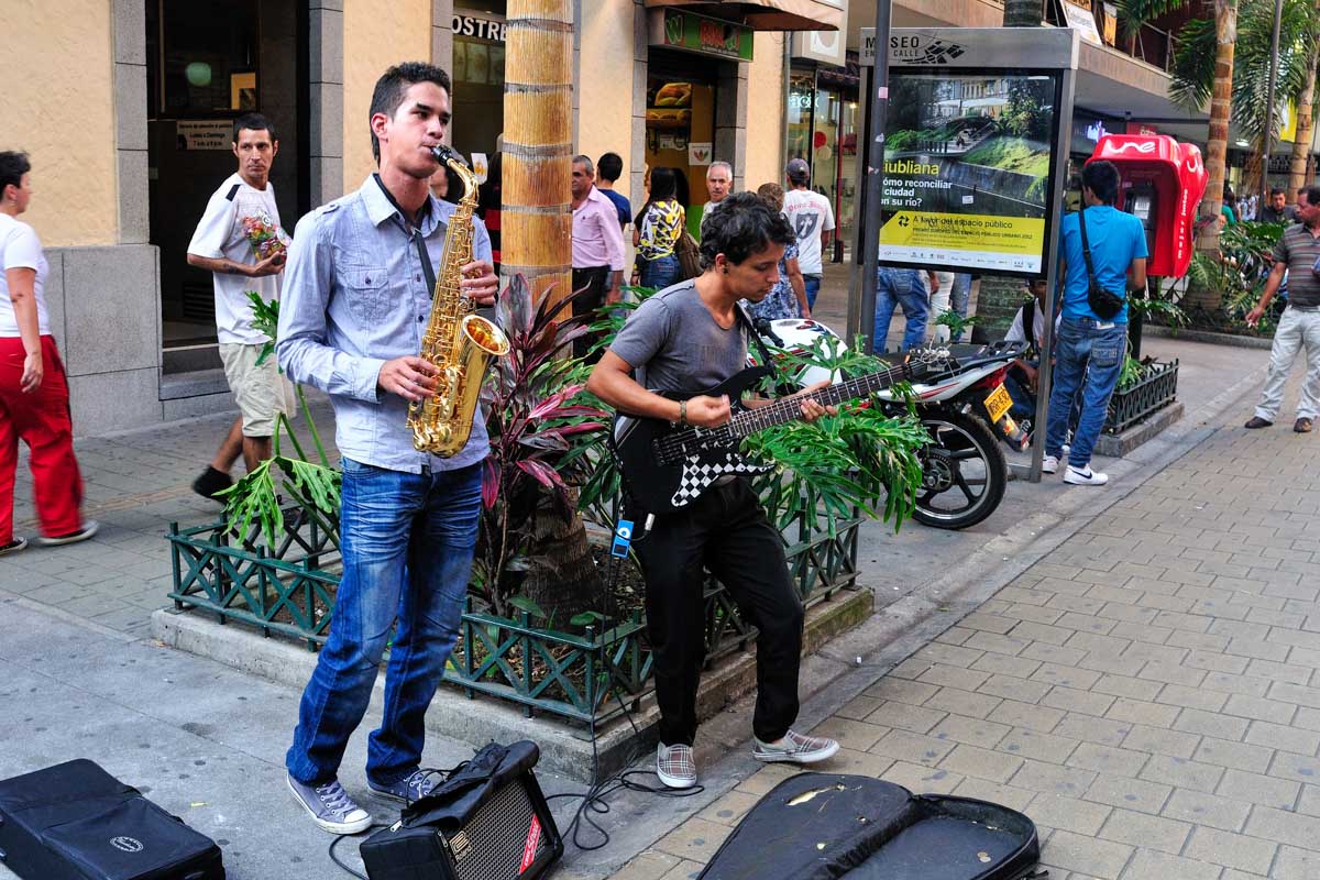 Men play instruments in Medellin Colombia