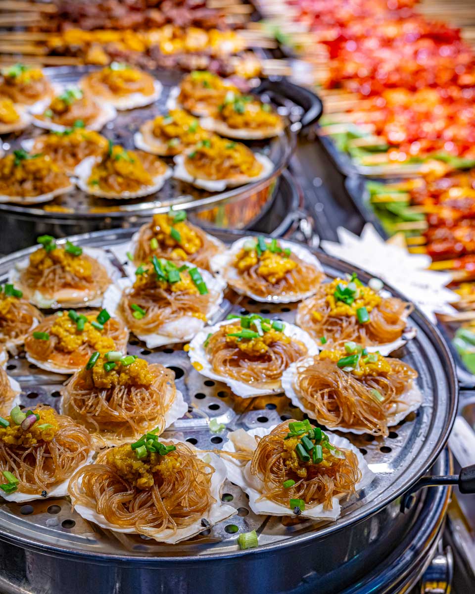 Street food sold at Jalan Alor market in Bukit Bintang district Kuala Lumpur Malaysia