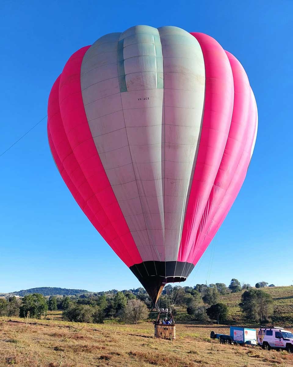 A hot air balloon ready to take flight over Brisbane with Floating Images Hot Air Balloon Flights