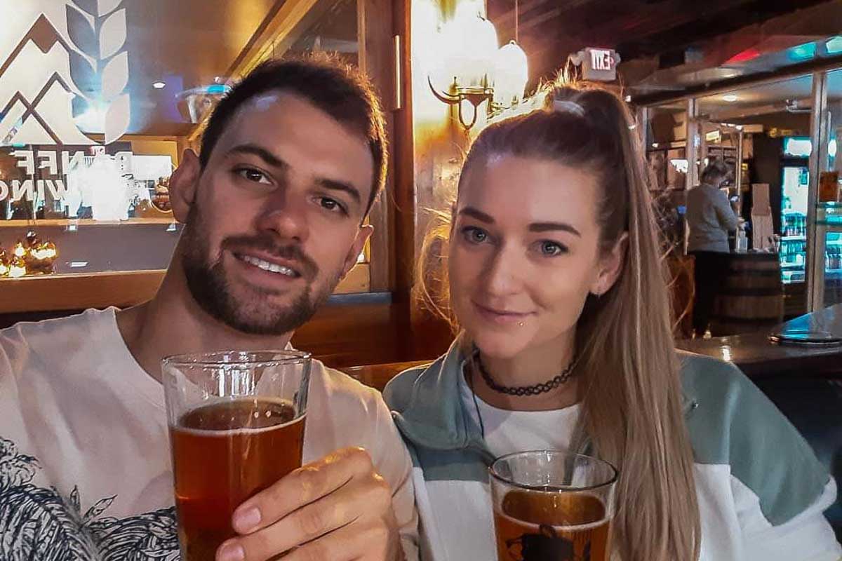 Bailey and Dan take a selfie with beer at Banff Brewery