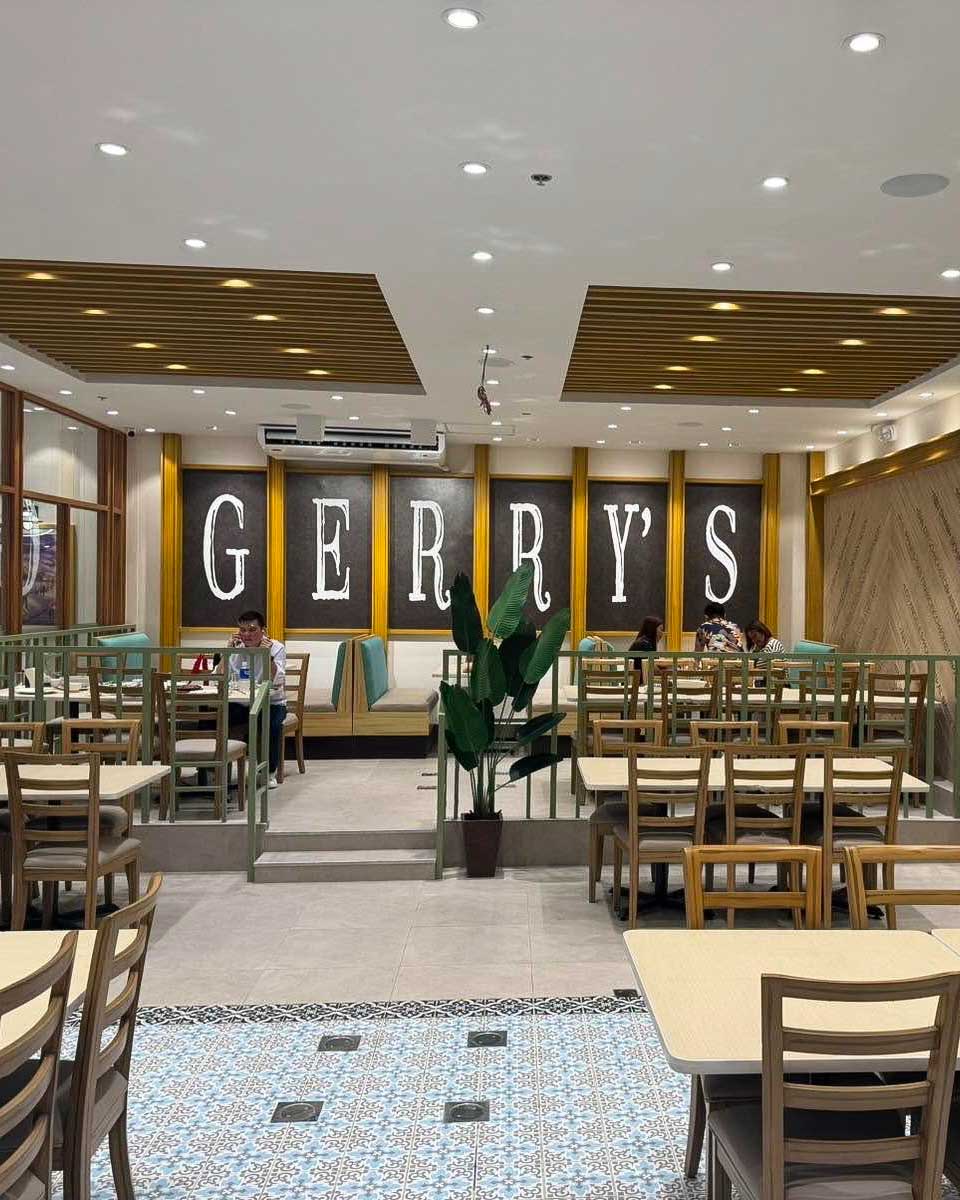 People eat dinner at Gerry's Grill in Manila, Philippines