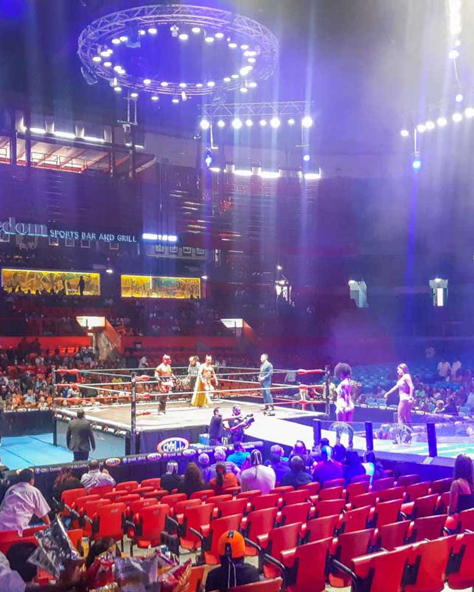 Wrestlers-walk-to-the-ring-at-the-start-of-a-Lucha-Libre-show-in-Mexico-City