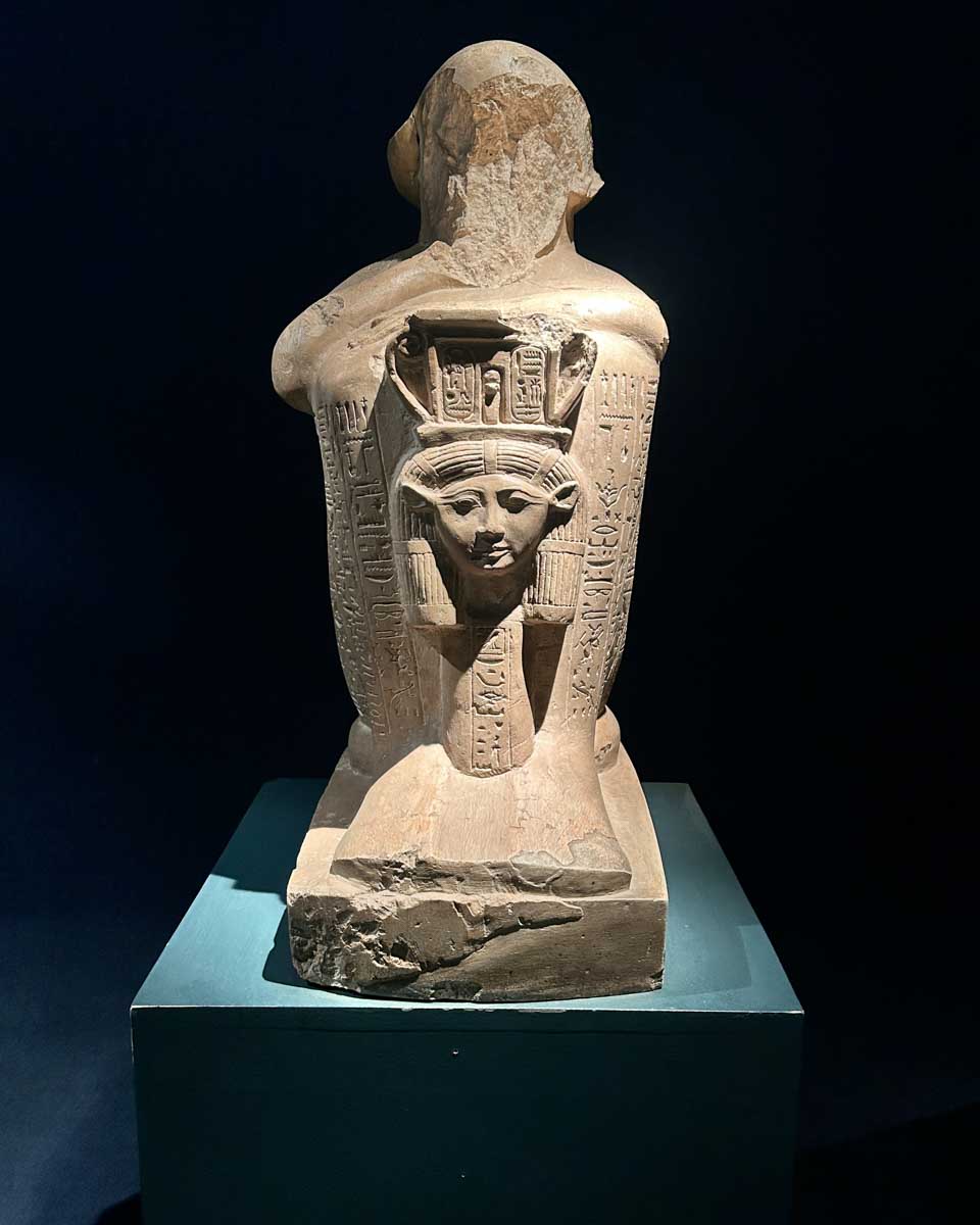 A statue with hieroglyphic inscriptions seen in the Luxor Museum