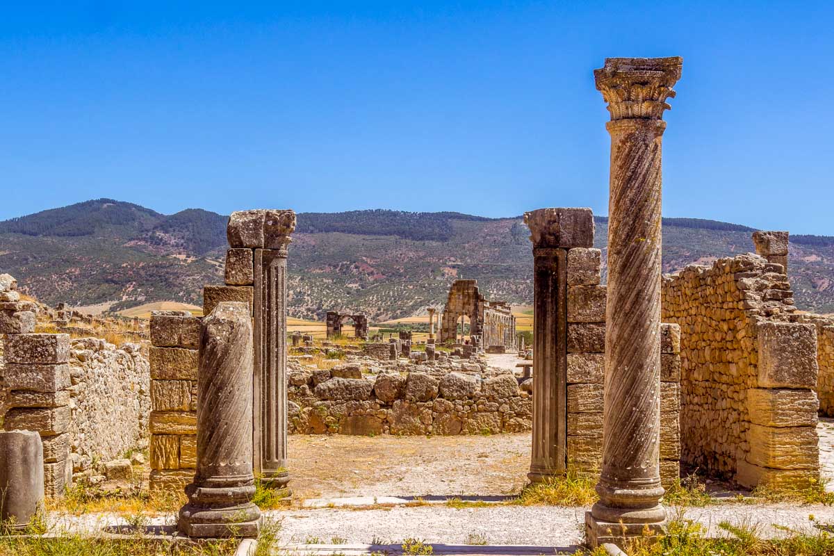 Ruins of the roman basilica of Volubilis on a tour from Fez Morocco