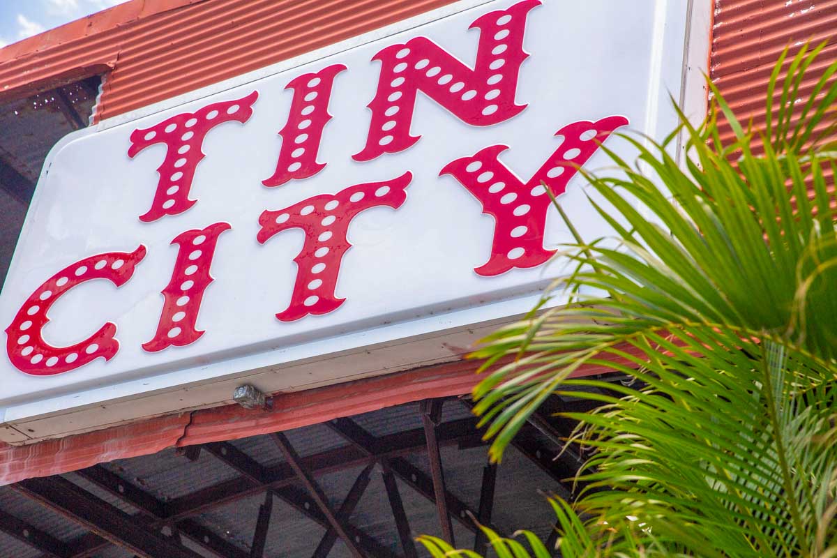 Tin City Sign at the Entrance Way in Naples, Florida