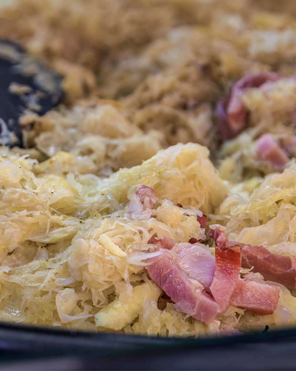 Traditional Alsacian choucroute garnie eaten on a winter food tour in Strasbourg France