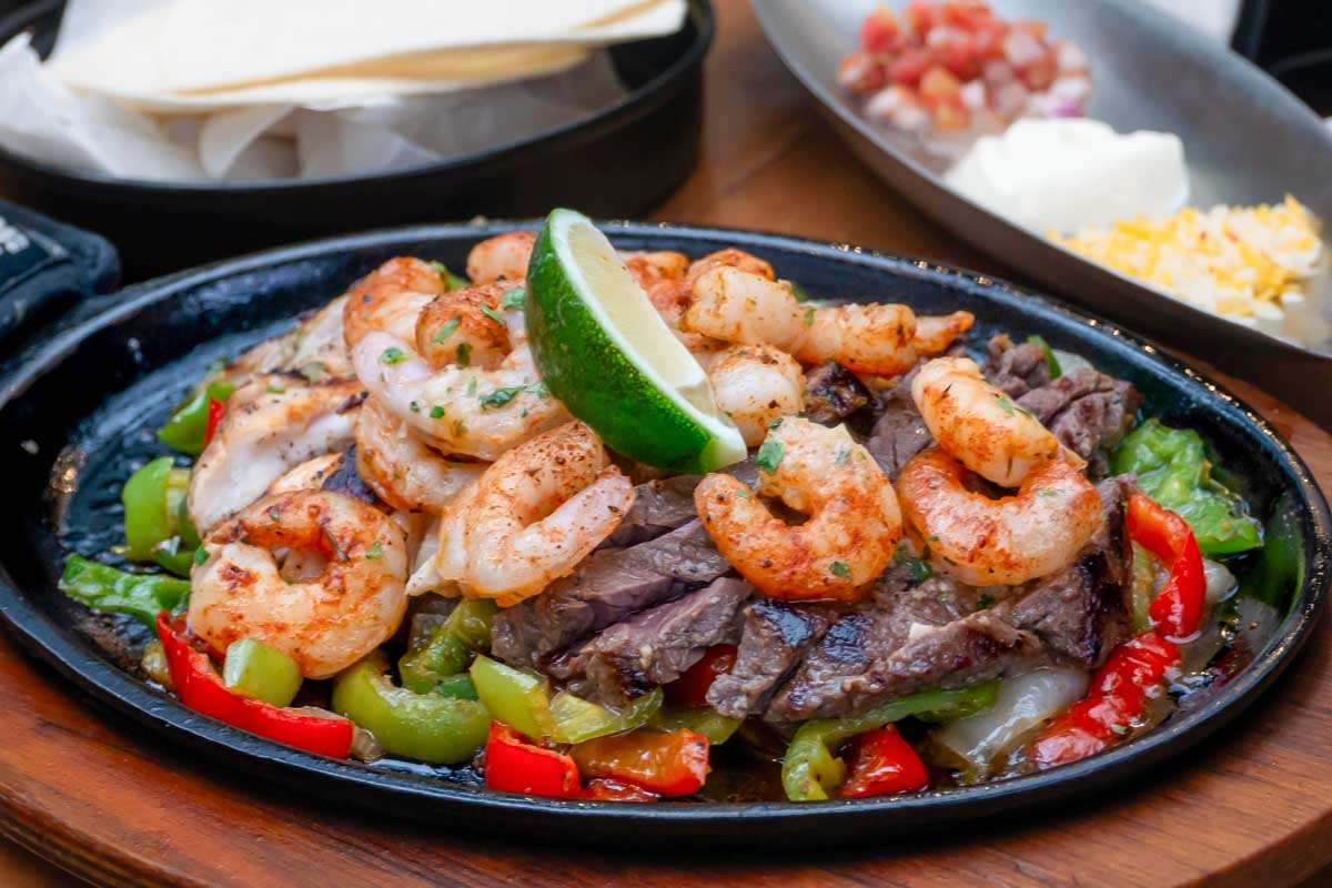 Dinner food meal with shrimp and meat eaten in San Miguel de Allende Mexico