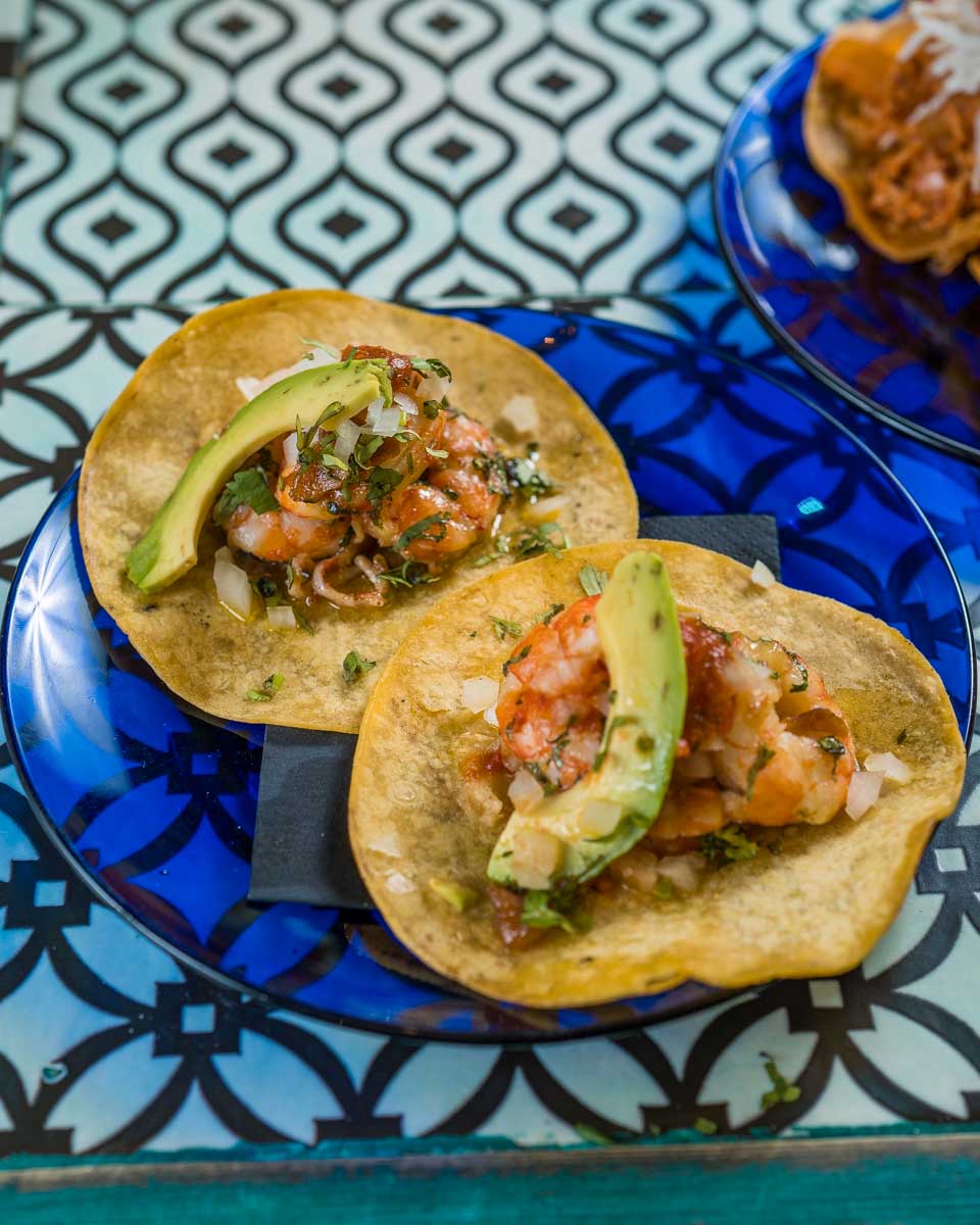 Salbutes-y-Panuchos-eaten-on-a-food-tour-in-Ambergris Caye Belize