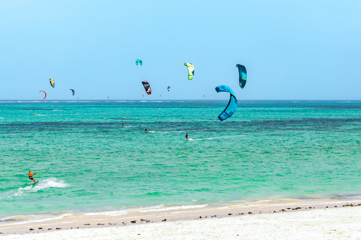 Kite surfing in ocean in Paje beach, Zanzibar, Tanzania